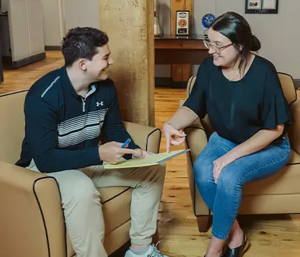 employees-talking-smiling