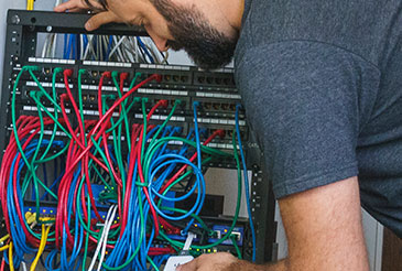 Ryan working on a switch for the network